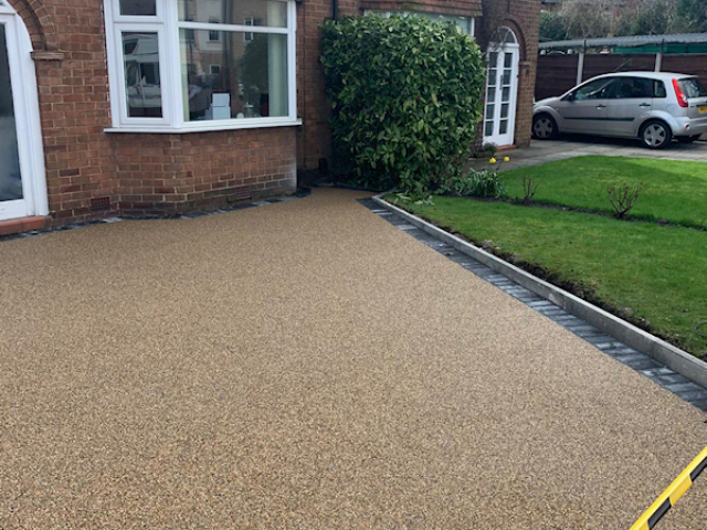 New resign bound driveway in Timperley