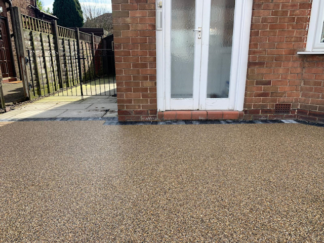 New resign bound driveway in Timperley