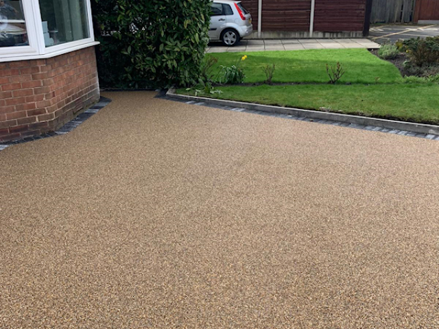 New resign bound driveway in Timperley